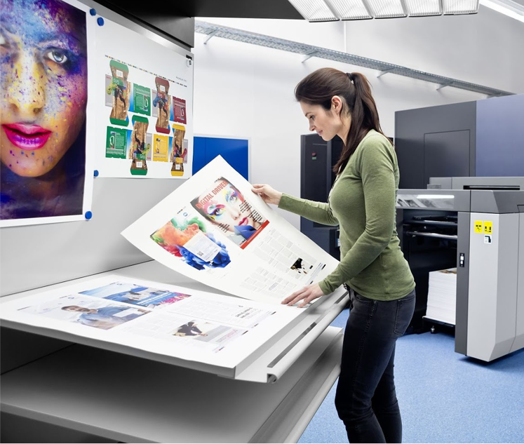 a women in poster printing lab